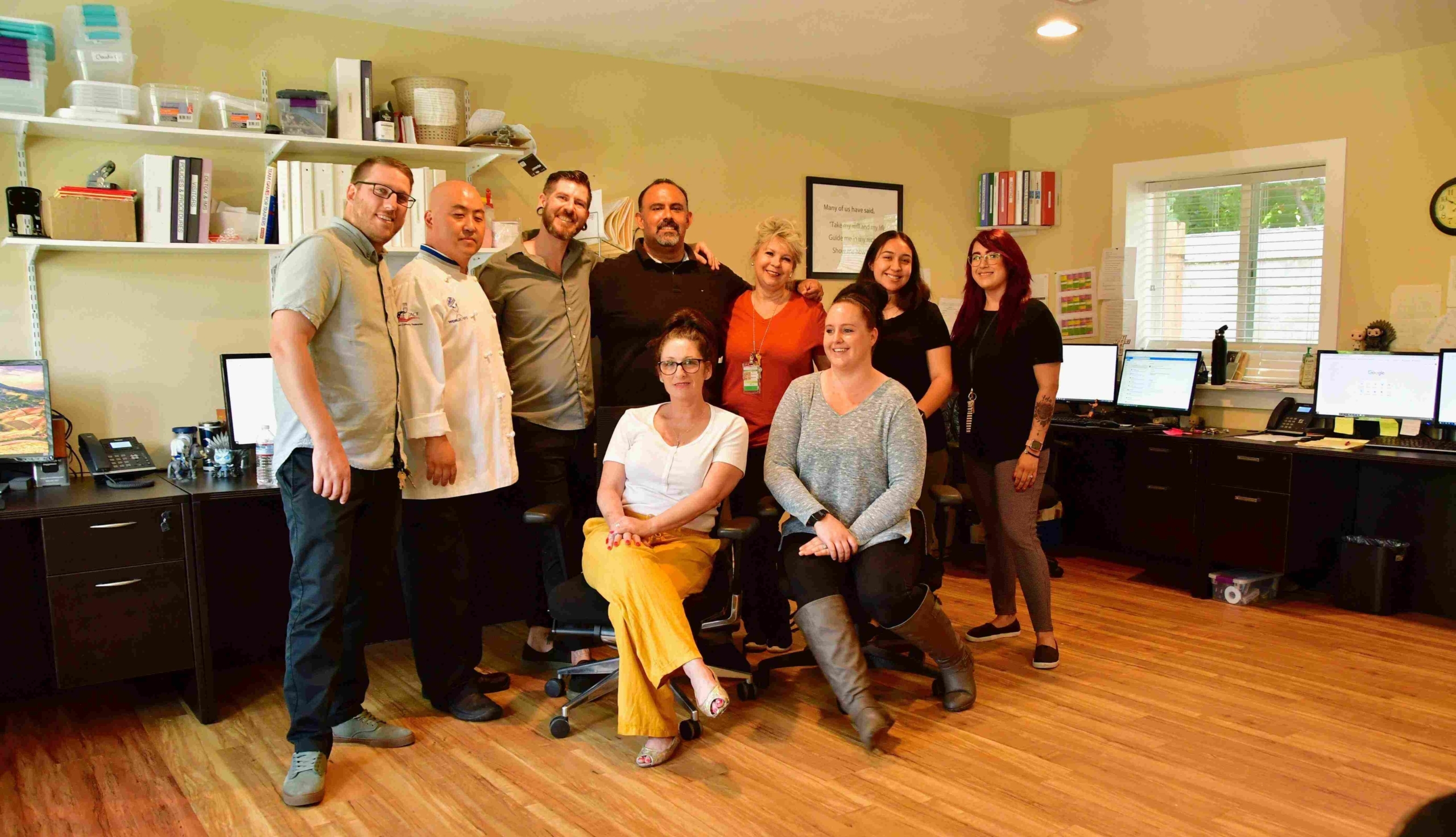 The team at DivineDetox.com poses for a pic at their premier addiction treatment facility